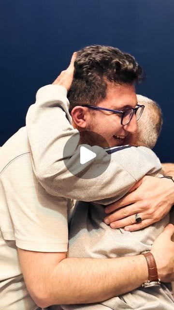Yaser Al Rayyes embracing his father Arafat during their reunion in Cairo on 17 June 2026